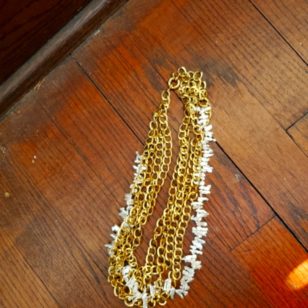 Uniquely shaped, natural authentic keishi pearl gold tone multi chain necklace